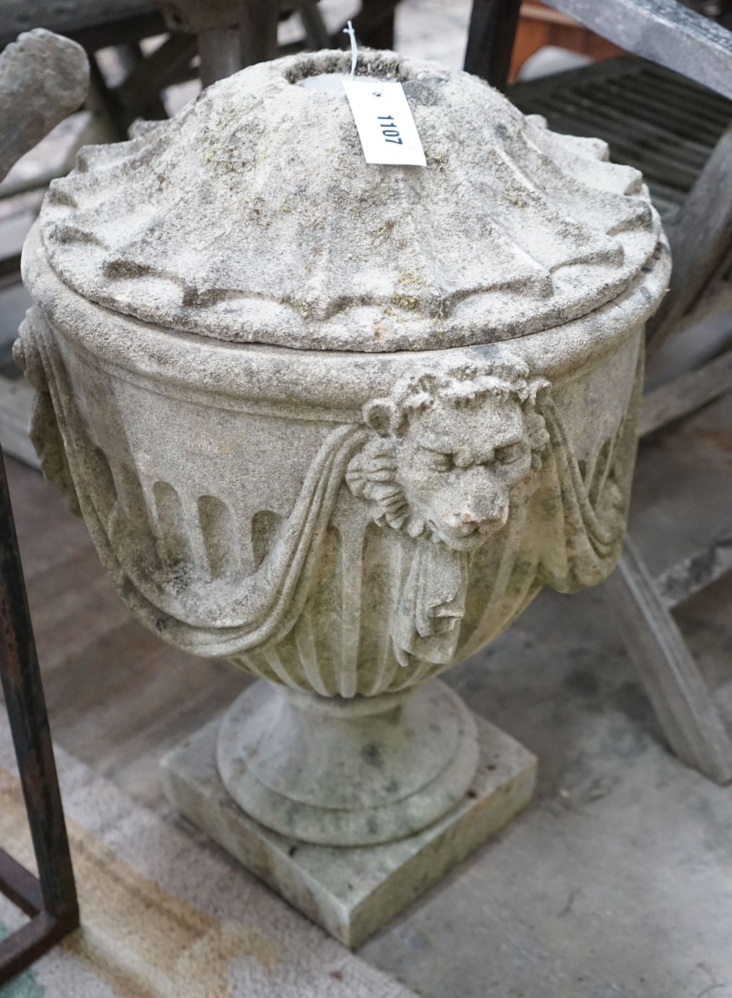An Adam design reconstituted stone garden lidded urn with lion mask body, diameter 40cm, height 60cm